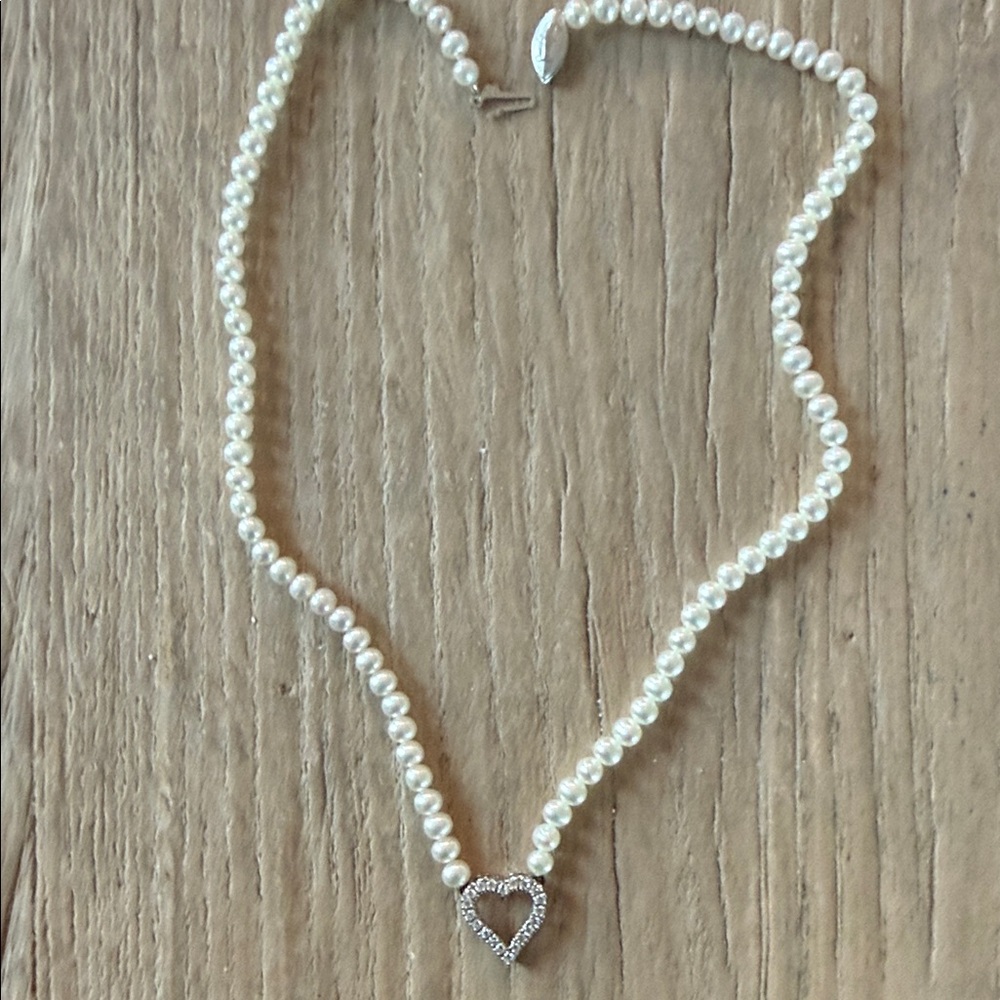 Pearl Necklace with diamond Heart Pendant - Ivory Pearls bought at fortunoff .